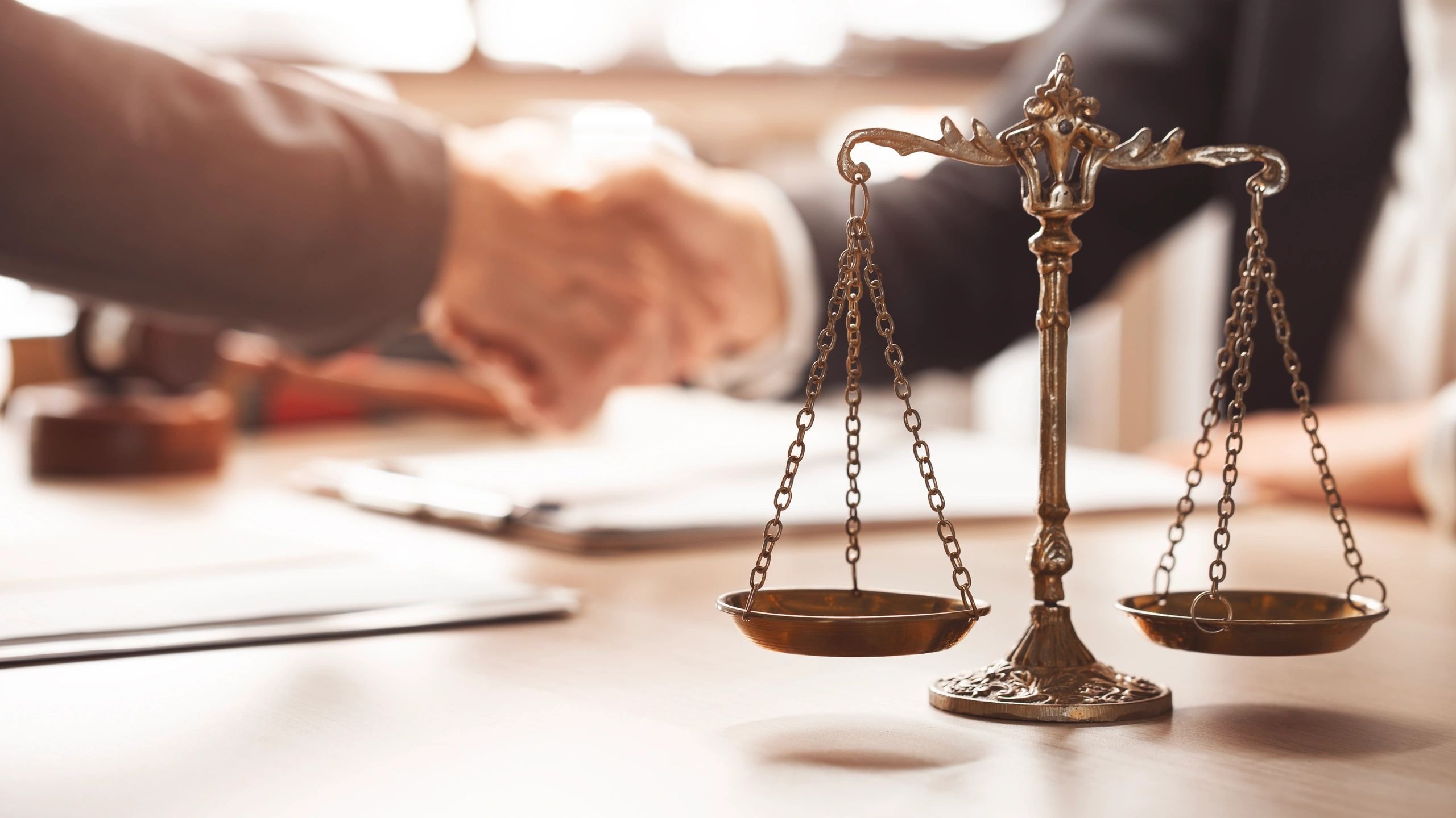 Scales of justice and legal document signing